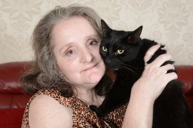 Janet-Rawlinson-and-Tomcat-Slinky-Malinki