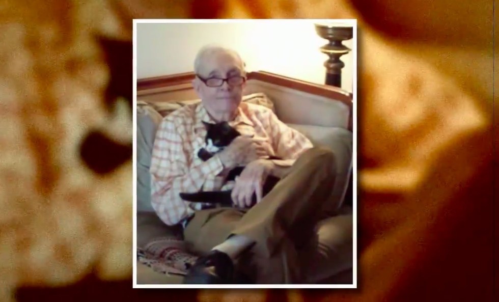 bill richardson holding cat