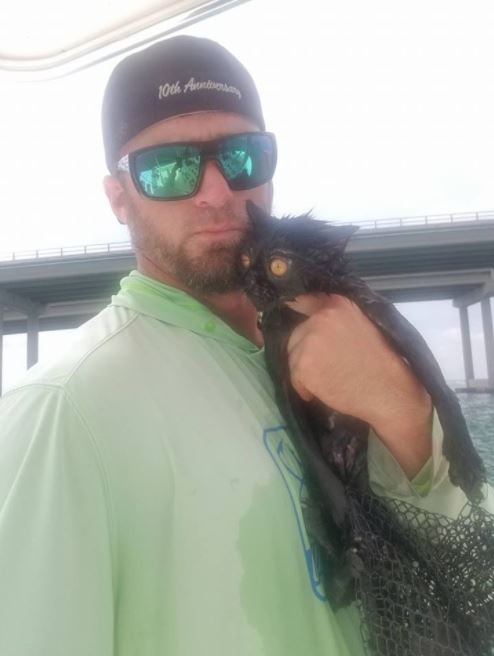 local boat captain saves cat tossed from bridge